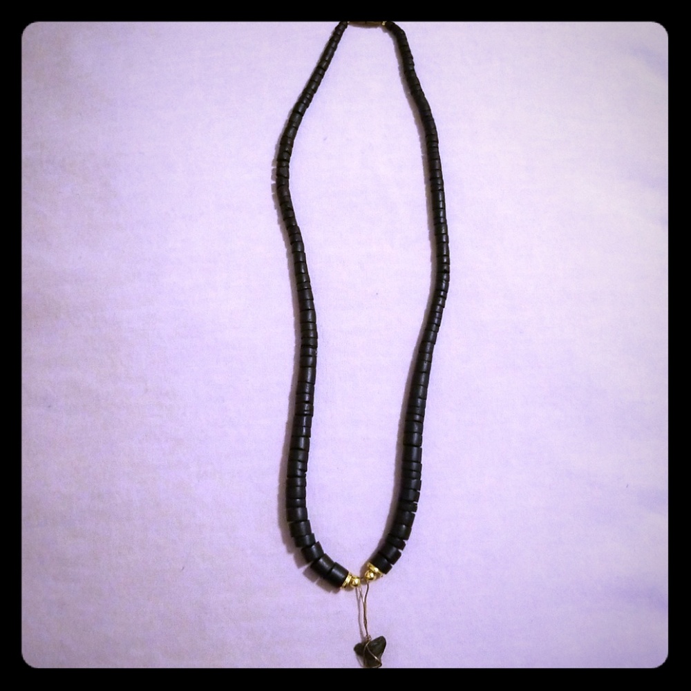 Black beaded necklace with shark's tooth!